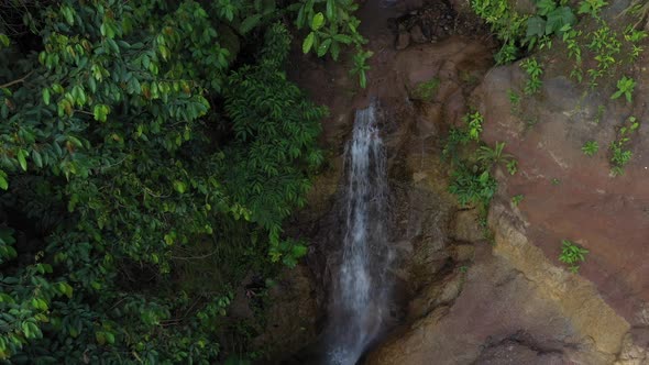 Aerial view of a waterfall in the tropical amazonian rainforest 