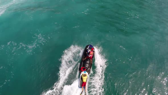 Aerial view of lifeguard surf rescue jetski personal watercraft in Hawaii