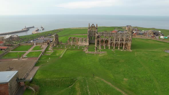 Ruins Of Whitby Abbey Overlooking The Sea, Popular Tourist Attraction In North Yorkshire, England. -