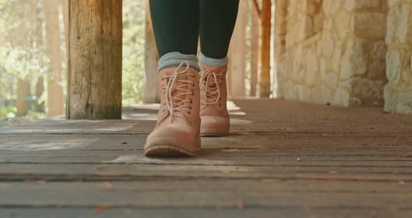 Outdoor Adventure and Nature Travel. Close Up Woman Legs in Pink Hiking Boots 