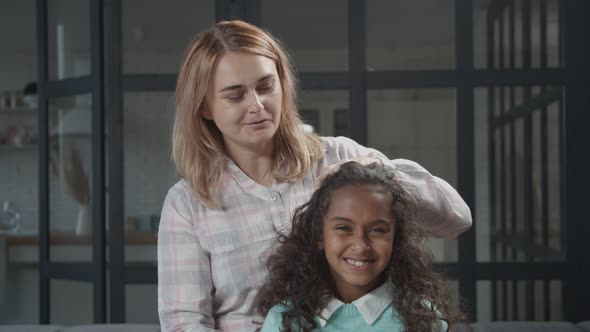 Portrait of Happy Mother and Mixed Race Daughter