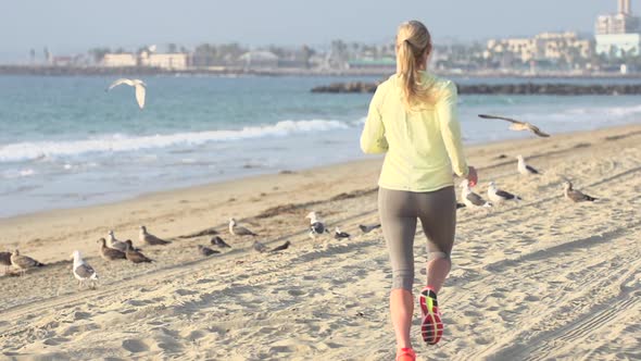 A woman running on the beach