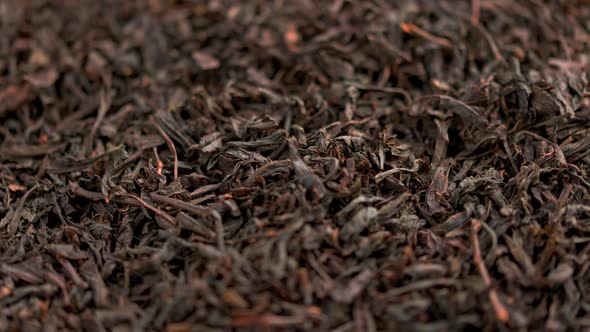 Looped Spinning Dry Black Tea Full Frame Closeup Background