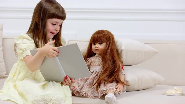 Girl Playing with a Doll