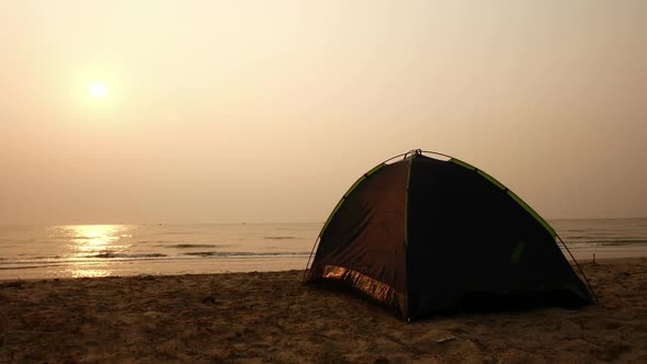 Camping on the beach at the sunrise