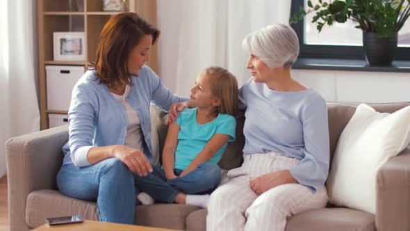 Mother, Daughter and Grandmother Taking Selfie 3