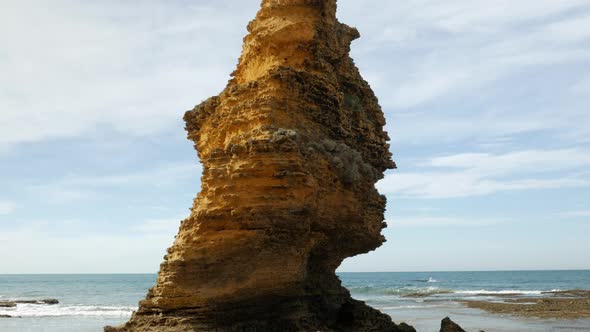 Rugged limestone rock formations located on the Great Ocean Road coast of Australia. TILT UP SHOT. W