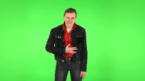 Guy Feels Very Bad, His Stomach Hurts. Green Screen