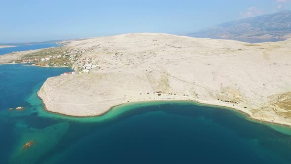 Flying above isolated beach of Pag island, Croatia