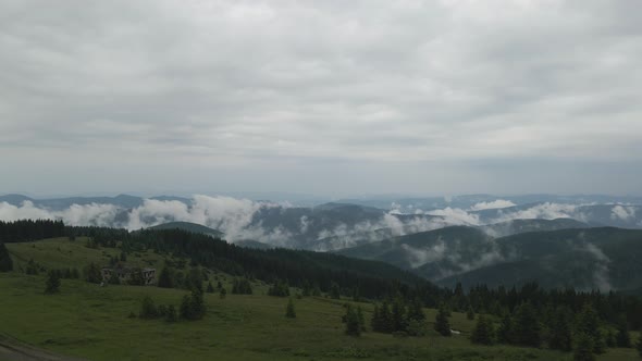 Aerial shot rising up above landscape in Carpathian mountains.