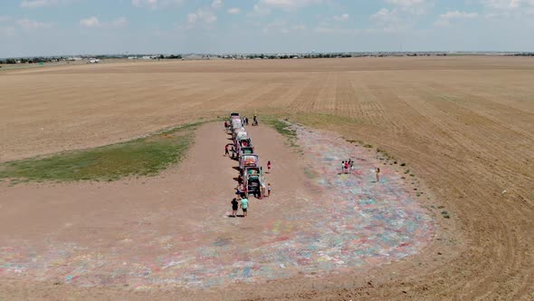 Drone footage of Cadillac Ranch in Texas during summer.