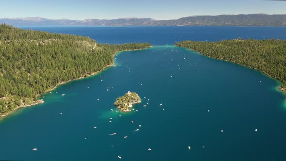 Lake Tahoe With Boats On The Turquoise Water - aerial drone shot