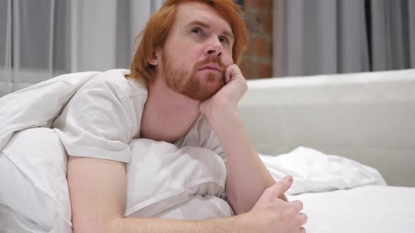 Thinking Redhead Beard Man Relaxing in Bed Brainstorming