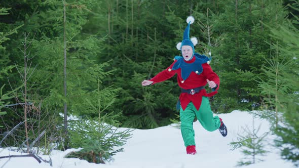 Christmas elf running and jumping