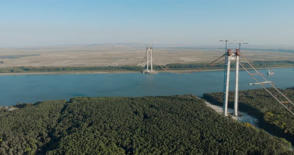 Aerial View Of Brăila Bridge In Romania, Under Construction Over The Danube River - drone shot