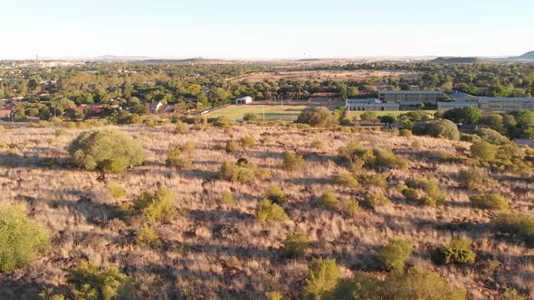 Drone Field Fly Over Sunny Day Slow Motion