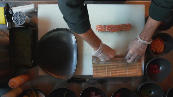 Overhead View of Cook Making Sushi in the Restaurant