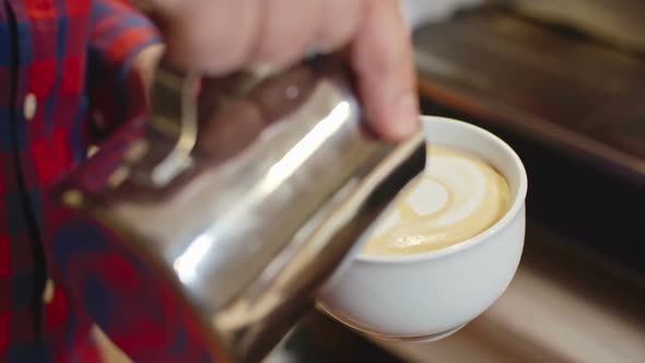 Barista Performing Latte Art