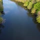 View of the river from above. Flight over water and forest trees from a height - VideoHive Item for Sale