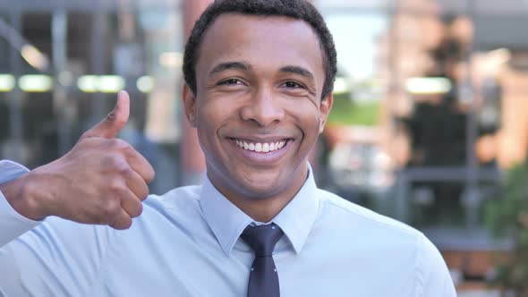 Thumbs Up by African Businessman, Outdoor