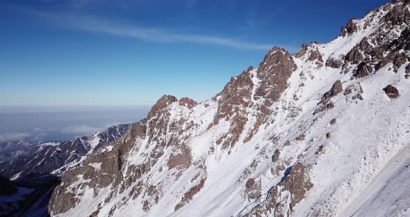 Huge Rocks Covered with Snow