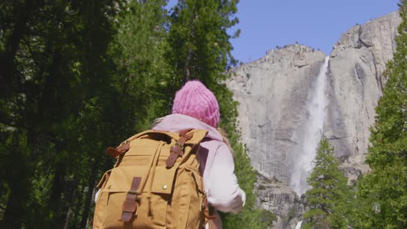 Happy Smiling Woman with Backpack Taking in Yosemite Woods Slow Motion Woman 6K