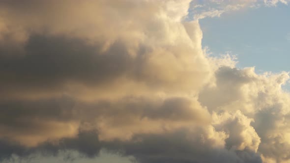 Clouds at Sunset Float on the Sky