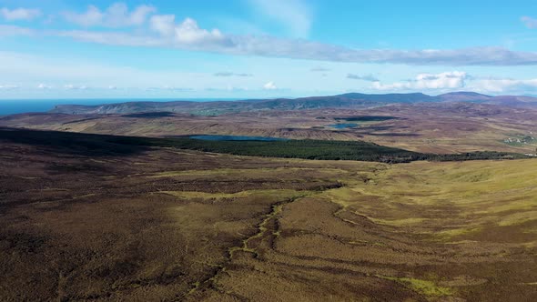 Aerial View of the Beautiful Coast at Malin Beg with Slieve League in the Background in County