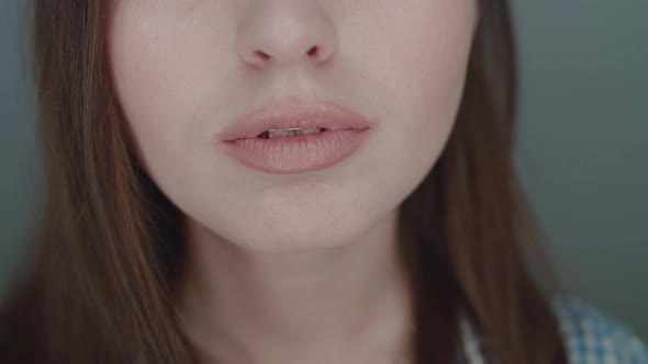 Close View of the Girl Shows a Sign for Silence