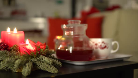 Christmas Advent Candles on a Table with Tea in an Apartment - Closeup