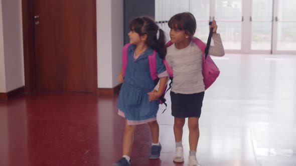 Cute Happy Primary School Pupil Girls Wearing Pink Backpacks