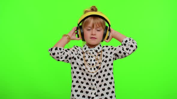 Attractive Blonde Child Kid Listening Music Via Headphones Dancing Disco Fooling Having Fun Party