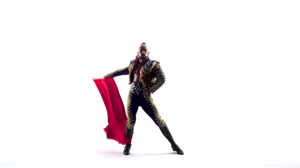 Handsome Toreador in Black Costume with Red Clothisolated Over White Studio Background