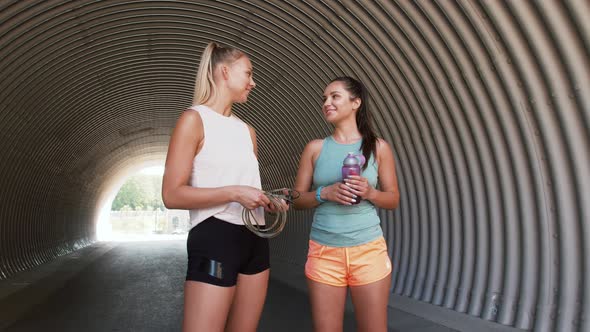 Women or Friends with Skipping Rope and Bottle