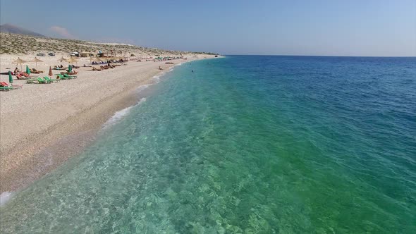 Waves splashing onto beach in Albania