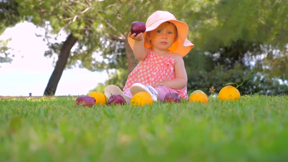 Kindergarten Background. Healthy and Cheerful Child Playing Outdoor. Beautiful Girl Playing with