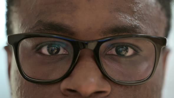 Close Up of Blinking Eyes of Young African Man