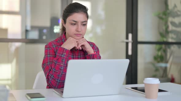 Indian Woman Working on Laptop