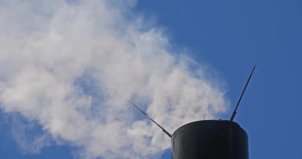Smoke and air pollution from a chimney in France.
