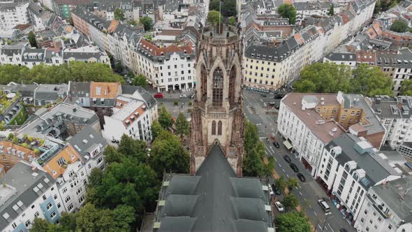 4k Aerial footage of the historic Saint Martin Church and surrounding area in Cologne, Germany