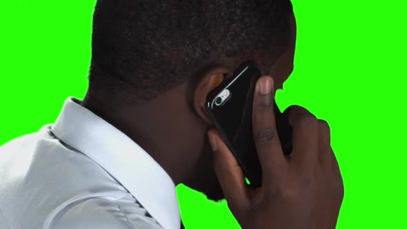 Phone Talking on Green Background.