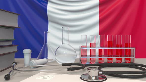 Clinic Laboratory Equipment on French Flag Background alt