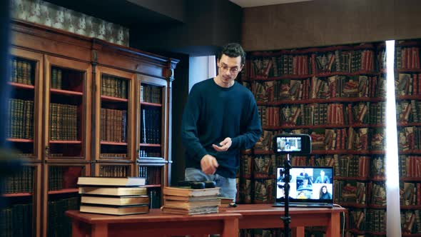 Male Librarian Is Holding a Lesson on the Internet