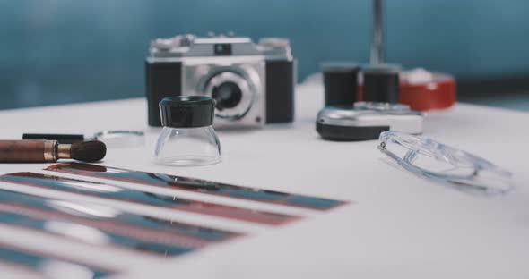 A desk of 35mm photo equipment