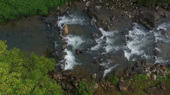 Aerial footage of river in forest
