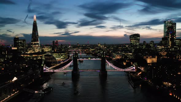 Aerial View of London over the River Thames including Tower Bridge, Shard and the Tower of London at
