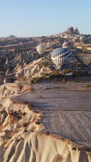 Vertical Video of Hot Air Balloons Flying in the Sky Over Cappadocia Turkey