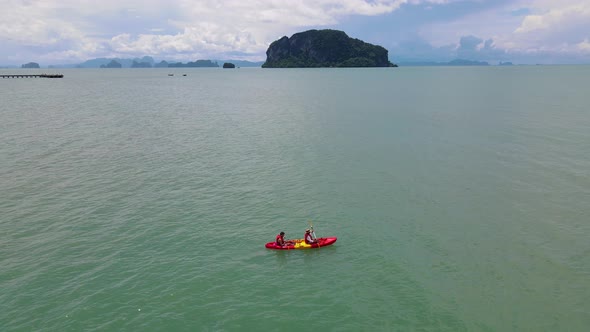 Men and Women in Kayak in Thailand in the Ocean Near Phuket Thailand