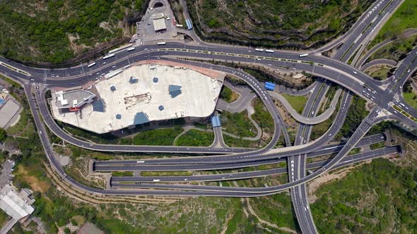 Massive multi level highway interchange with traffic on all routes, Aerial view.