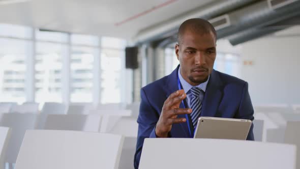 Male speaker practicing his speech at a business conference